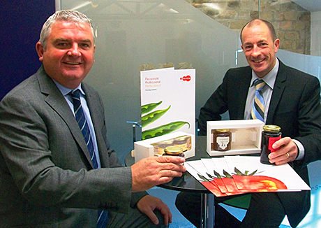 Chris Milnes, left, and PPS managing director Simon Bell with examples of Technocap lids.