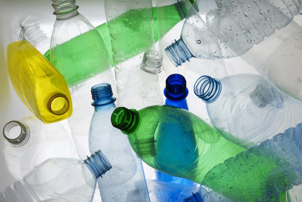 Backlit shot of various plastic bottles