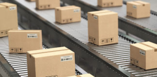 cardboard-boxes-on-conveyor-roller-in-distribution-6FZMTWA[90] (1)