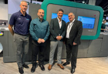 Mike Agness, Hybrid Software, Joe Sanchez and Ben Danon of Dantex Group, and Justin Bailey of Global Graphics Software celebrate their new partnership in front of the Pico digital UV inkjet press on the Dantex booth at Labelexpo Americas 2024.