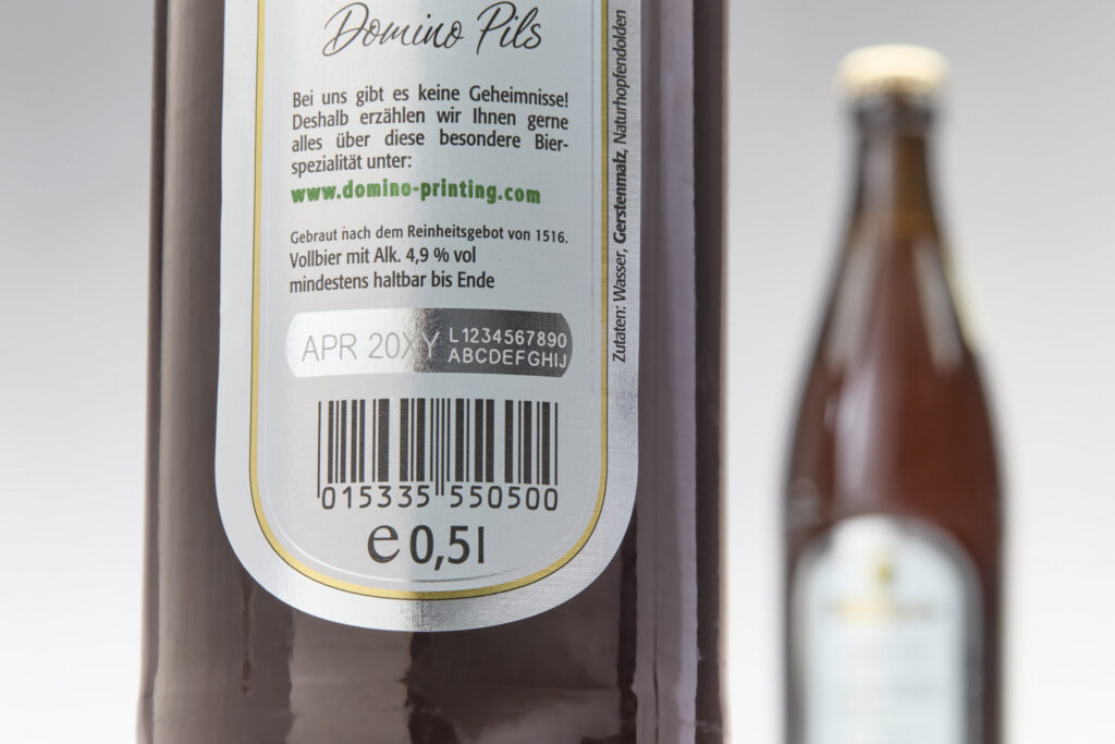 Laser coder for drinks