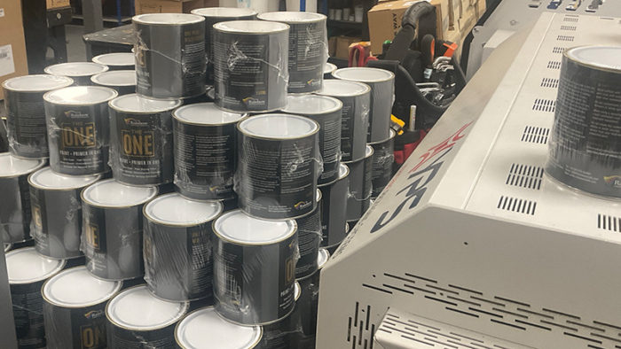 Amazon's liquids rules push a wood oil maker to automate packing